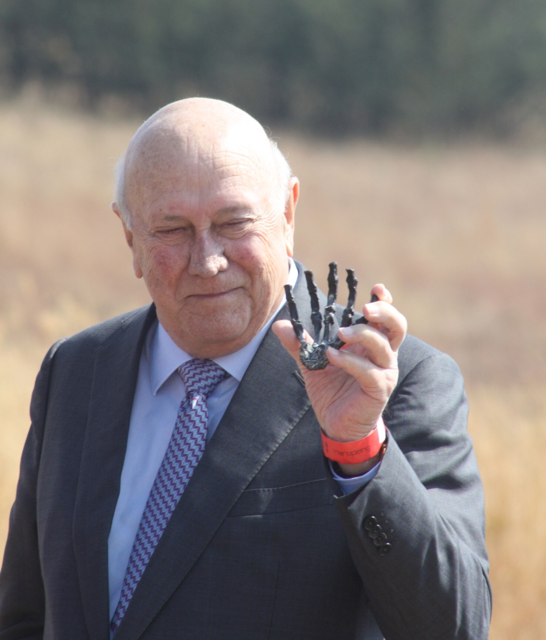 De Klerk With Bronze Sediba Hand